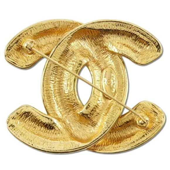 CHANEL Gold Logo Brooch